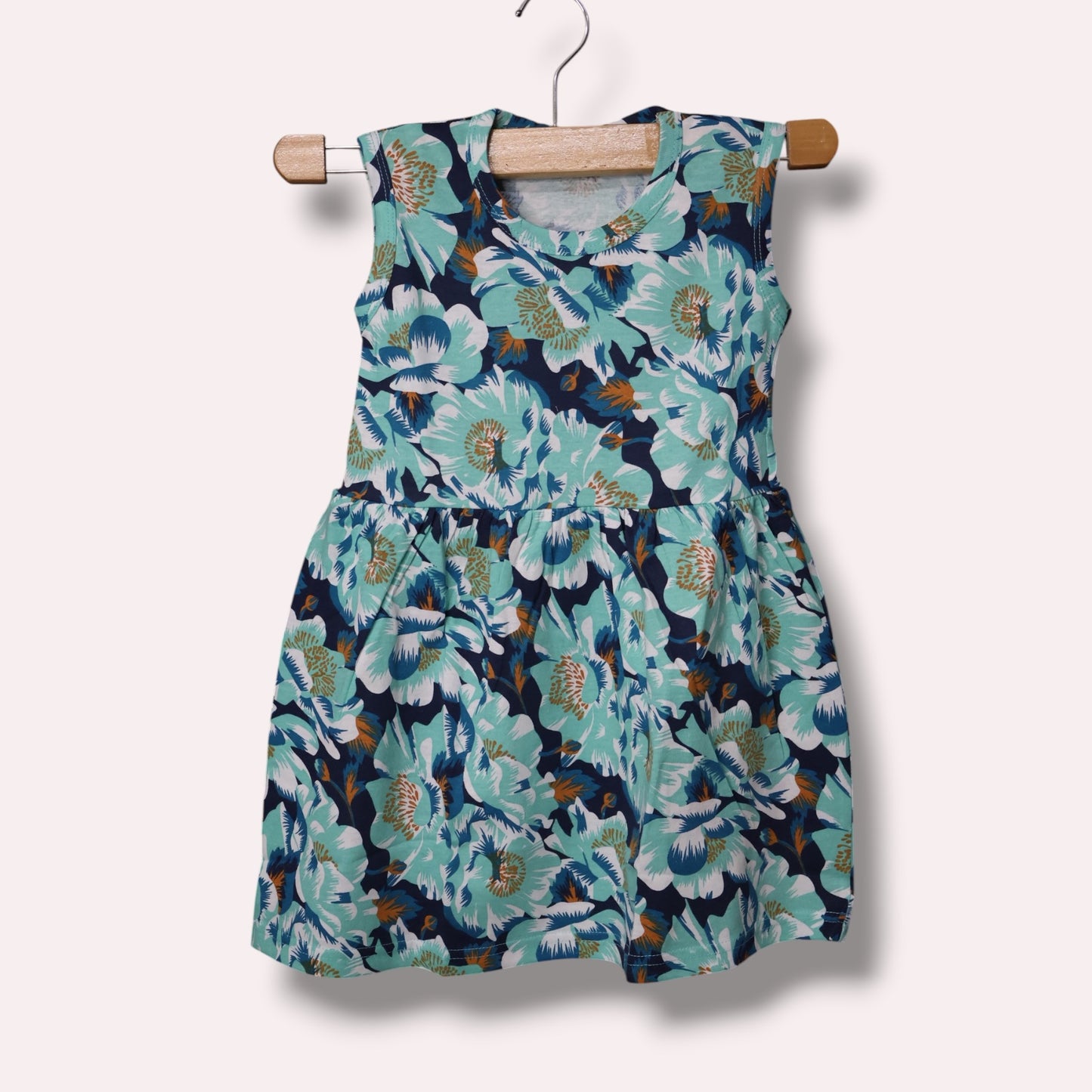 Aqua green baby girl frock with multicolor floral printed design