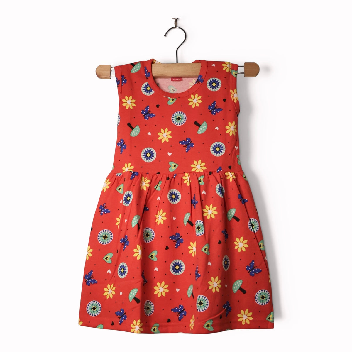Sunset red baby frock with playful floral and butterfly print