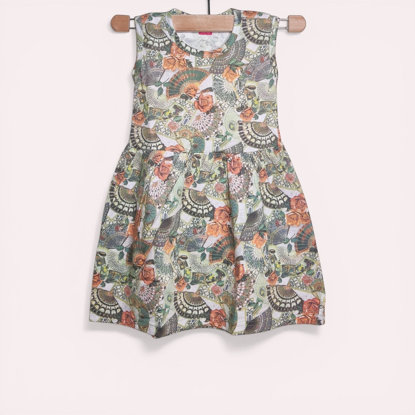 Vintage sage baby frock with printed floral and ornamental design