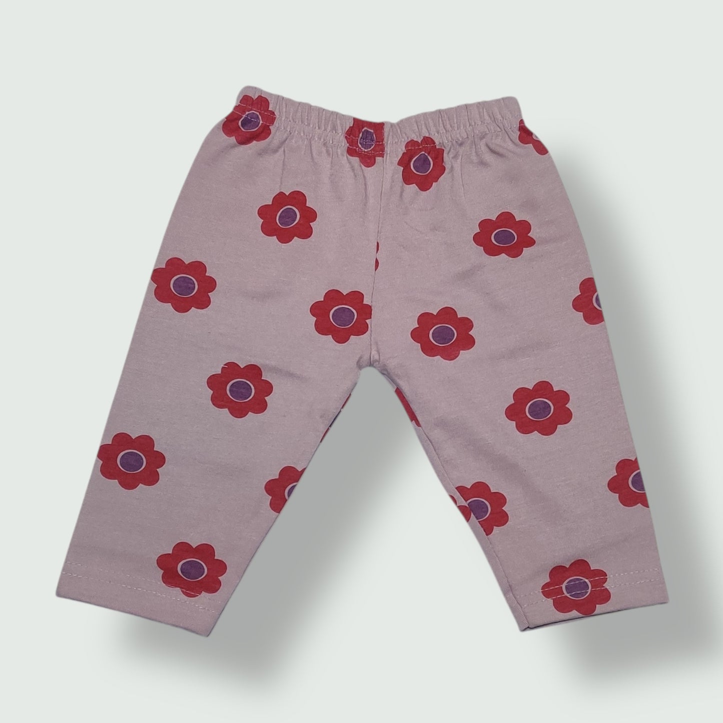 Pale mauve baby pant with red floral print front view