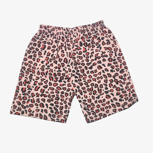 Peach beige baby shorts with all-over animal print
