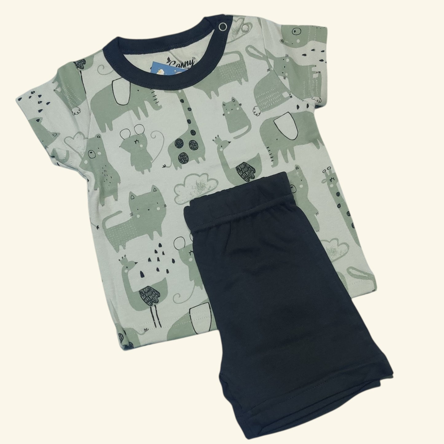 Green animal printed baby t-shirt with olive black shorts folded set view