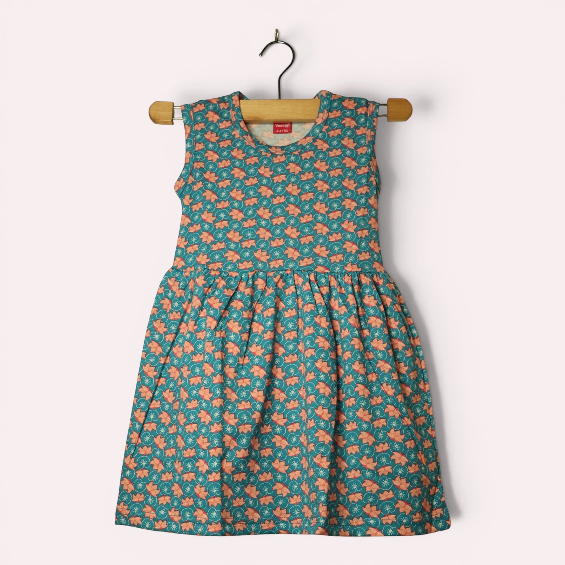 Aqua green baby frock with delicate floral print
