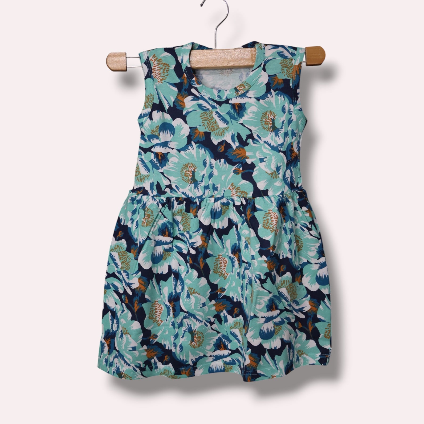 Aqua green baby girl frock with multicolor floral printed design