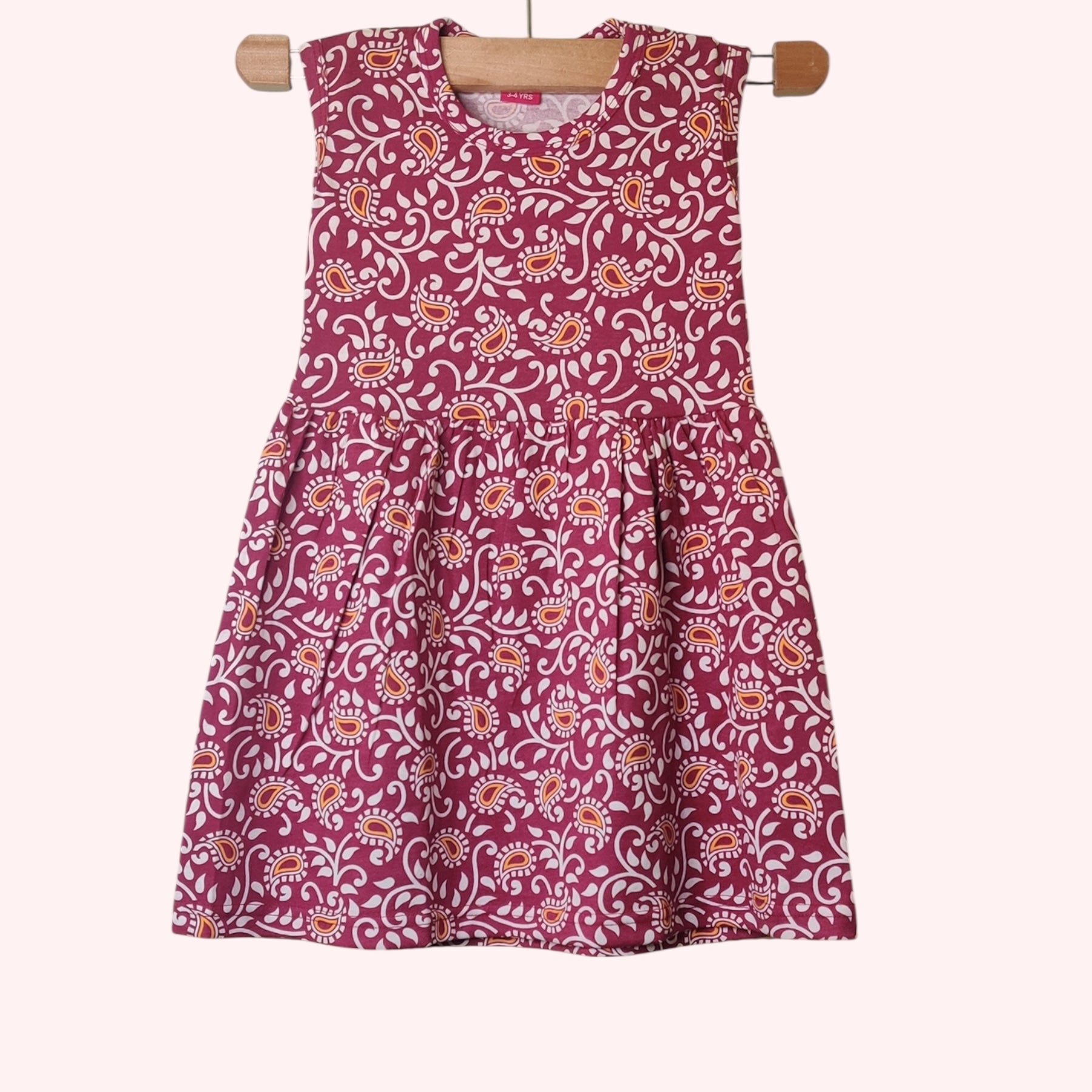 Berry red baby frock with printed paisley floral design