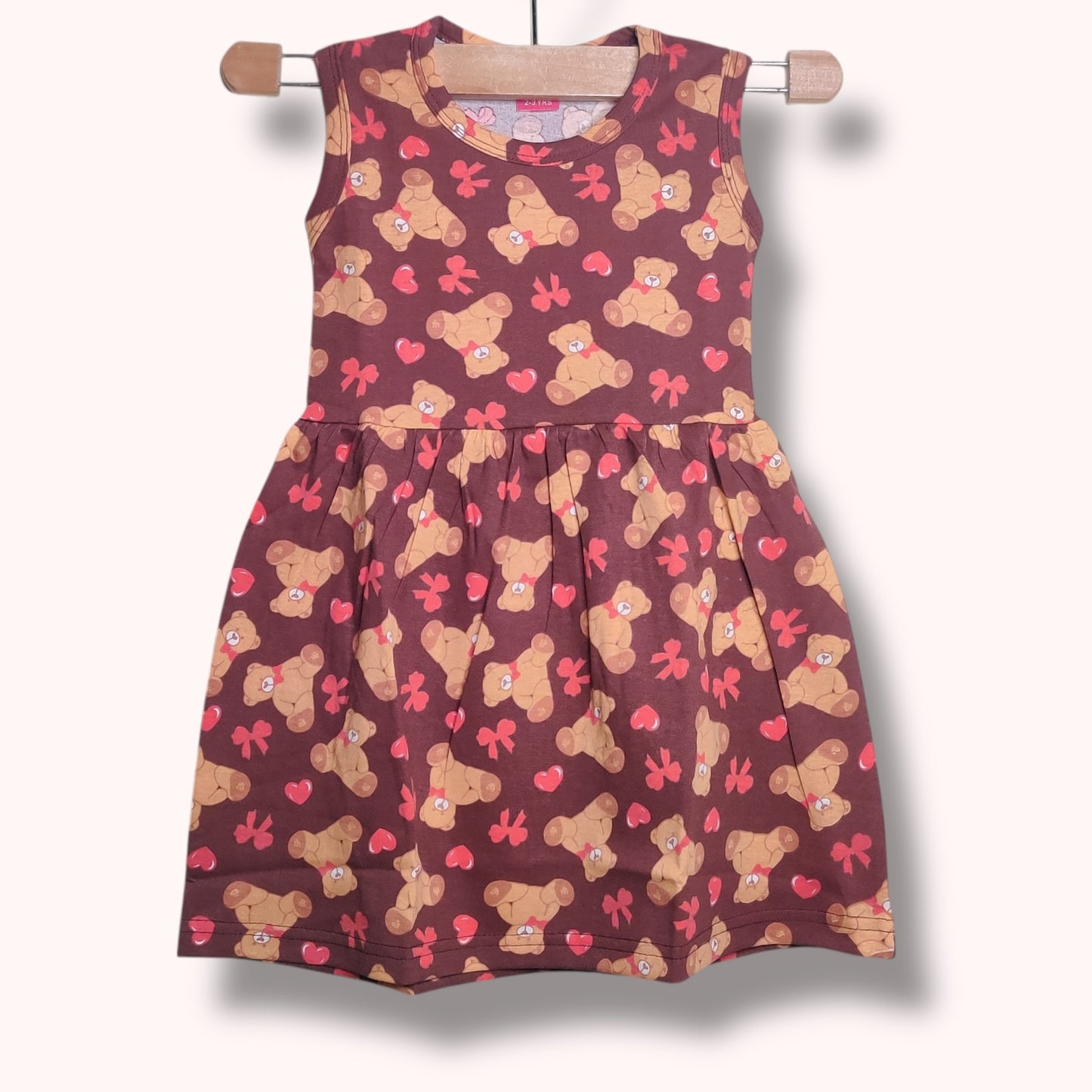 Cocoa brown baby frock with teddy and heart printed design