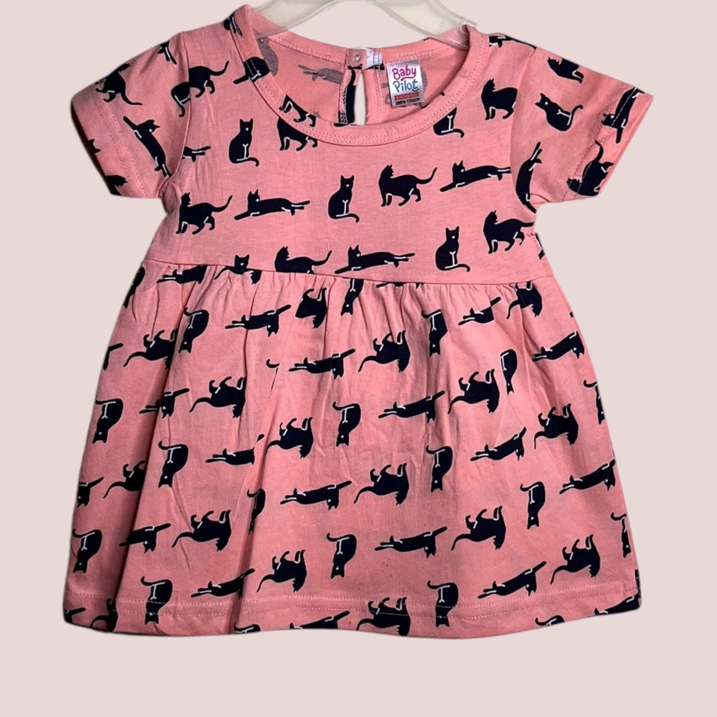 Coral blush baby frock with printed cat design