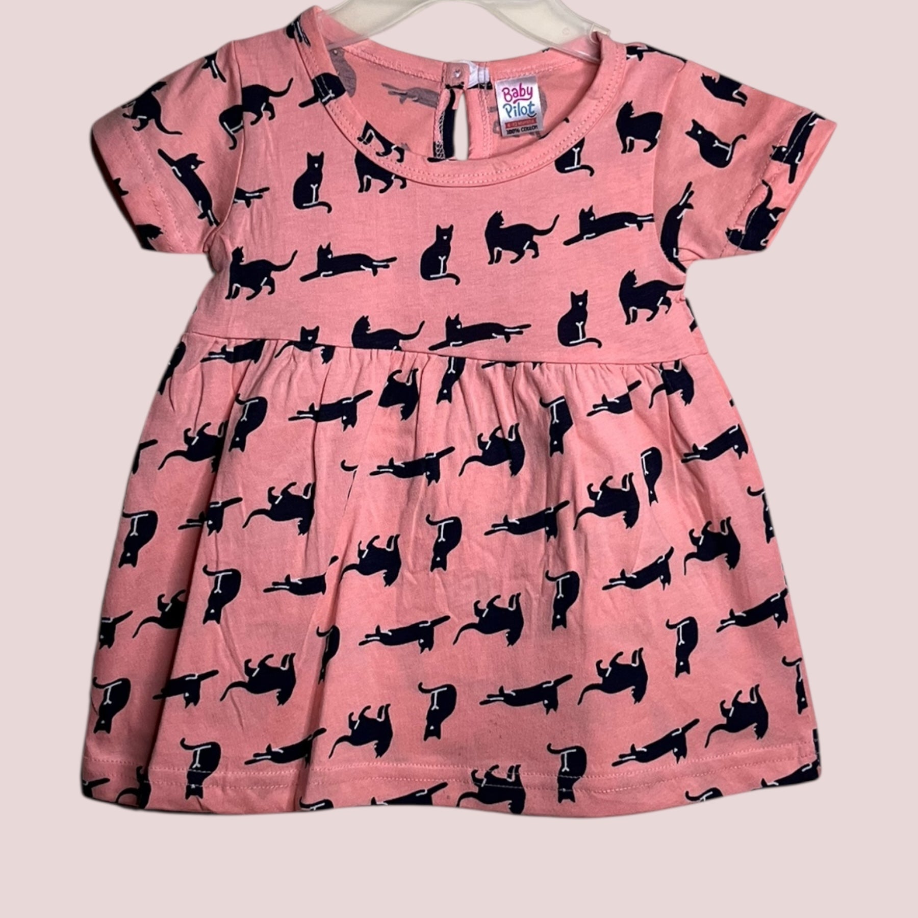 Coral blush baby frock with printed cat design