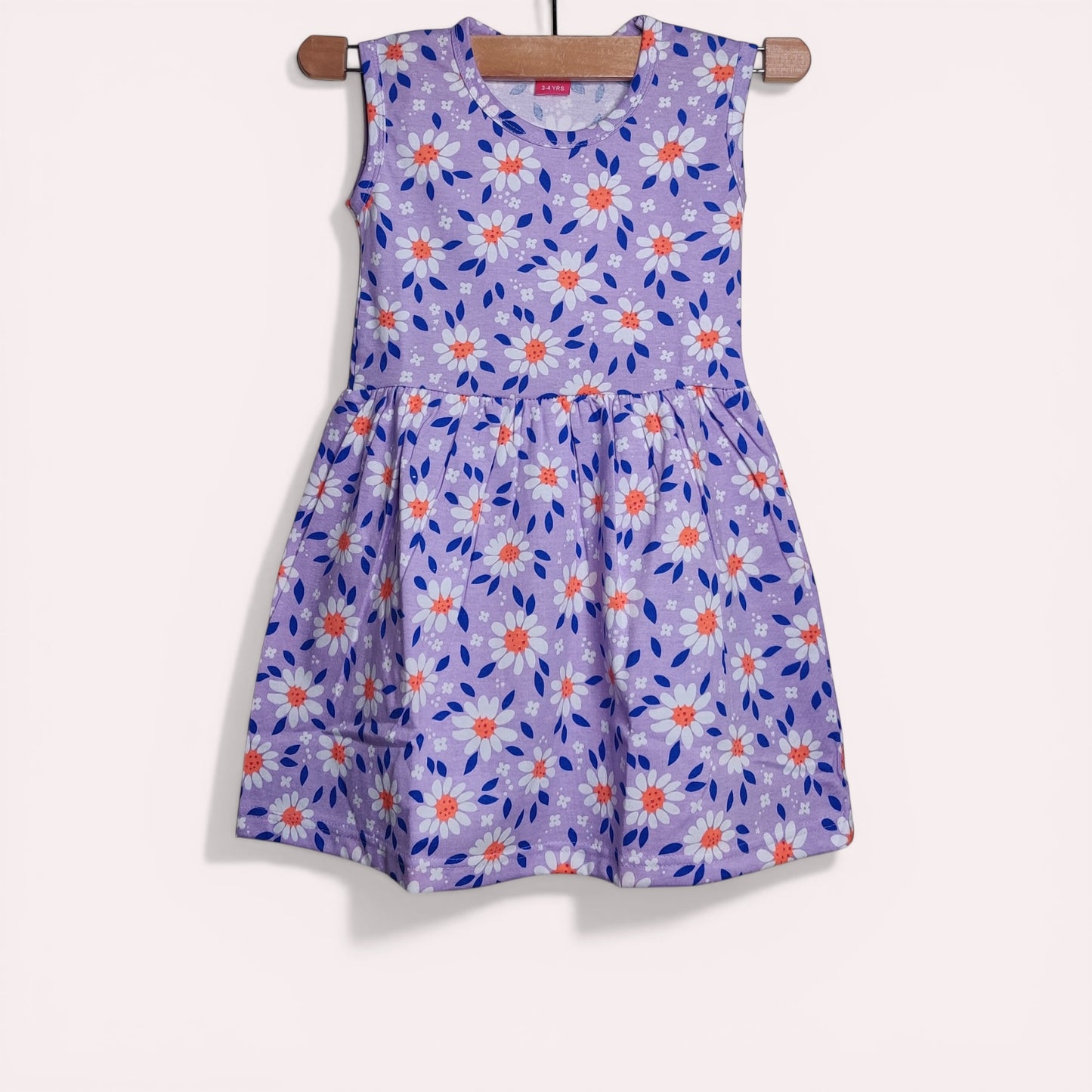 Lavender baby frock with printed floral design