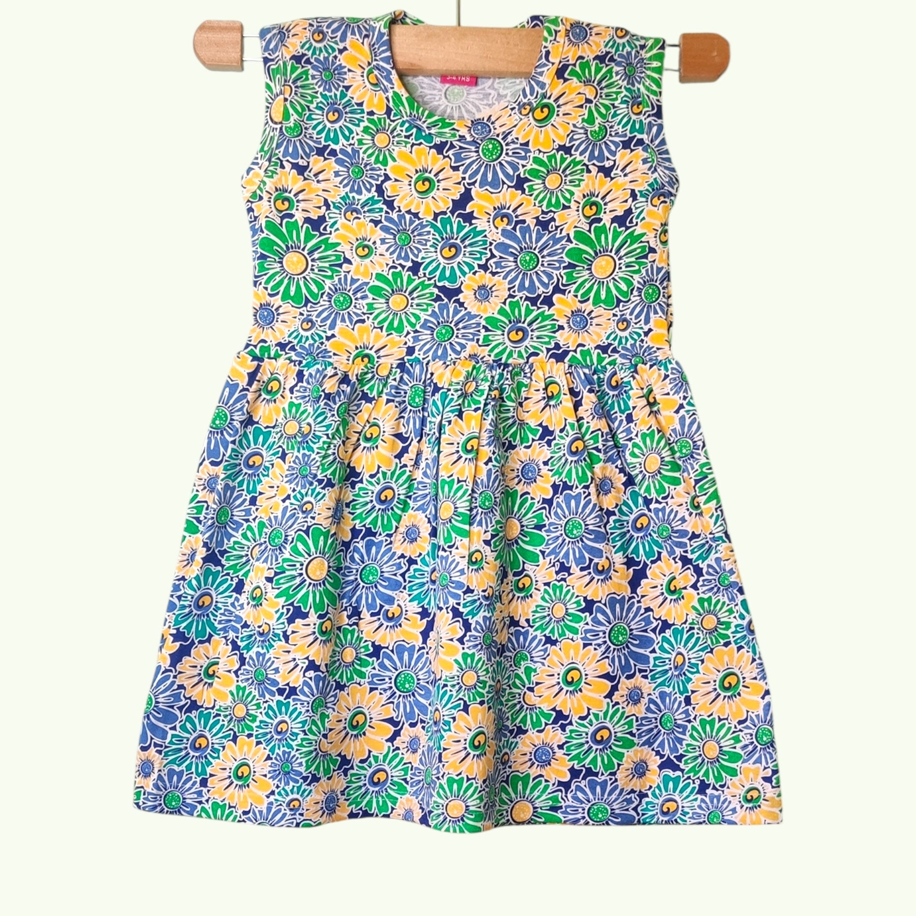 Meadow blue baby frock with printed floral design