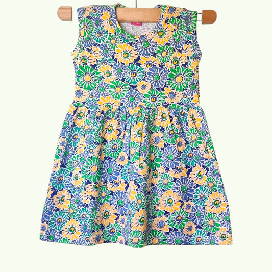 Meadow blue baby frock with printed floral design