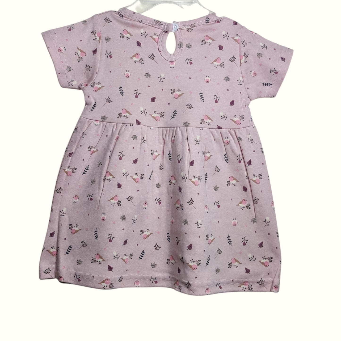 Pastel mauve baby frock with printed bird and leaf design back view