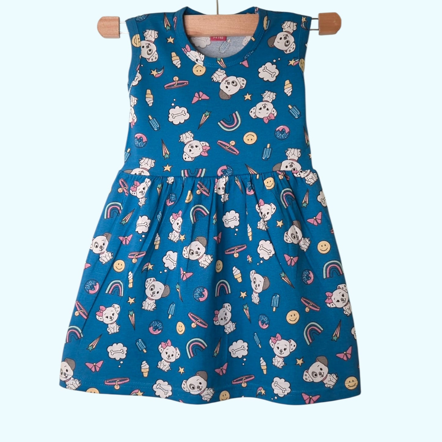 Peacock blue baby frock with printed cartoon and rainbow design