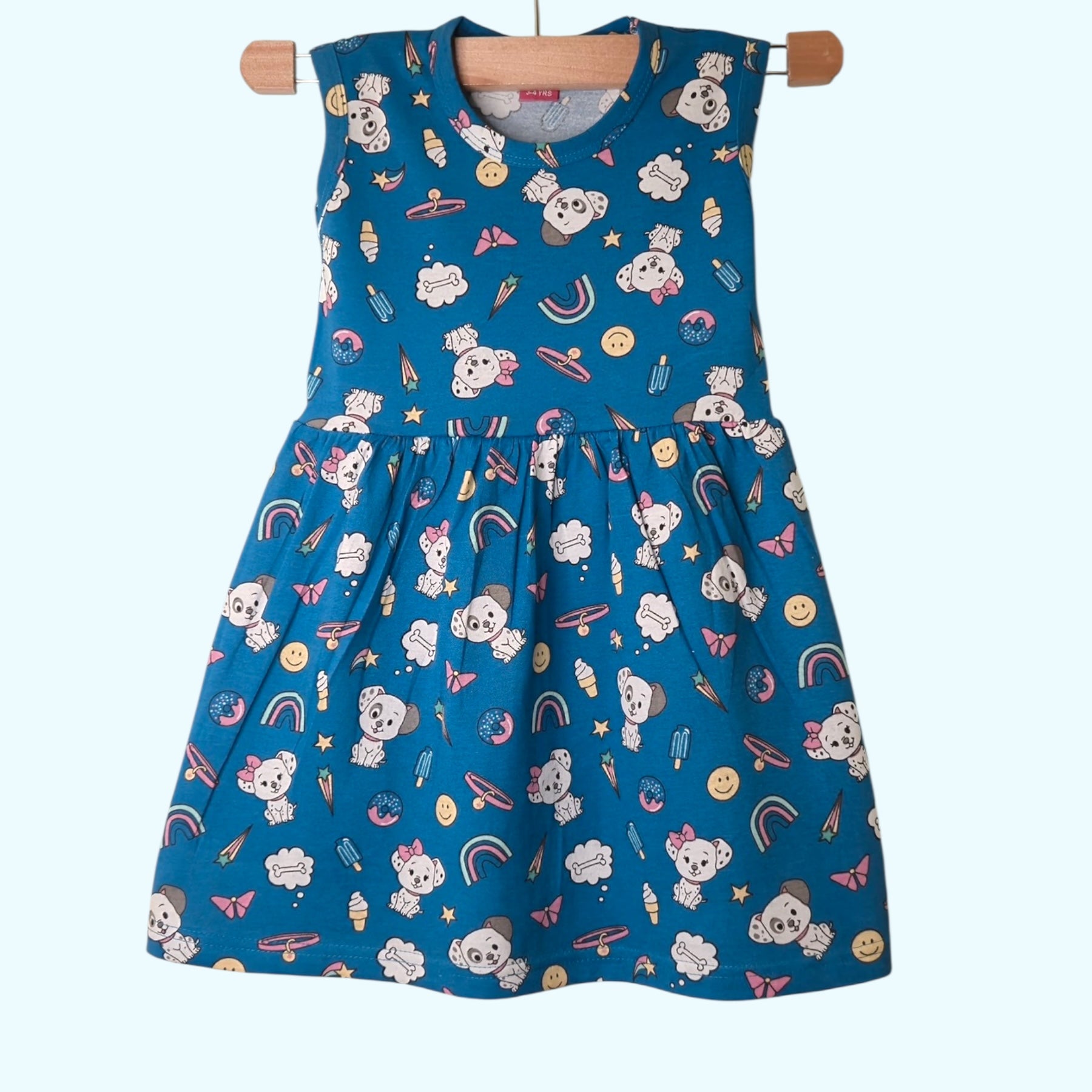Peacock blue baby frock with printed cartoon and rainbow design