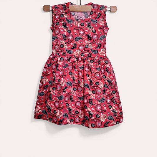 Red berry baby frock with printed paisley design