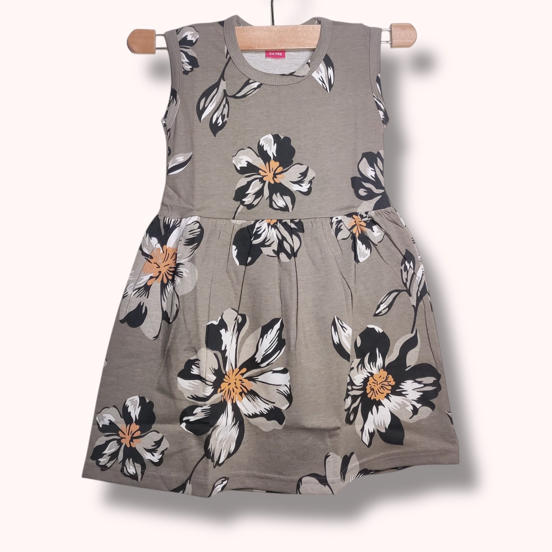 Taupe grey baby frock with floral printed design
