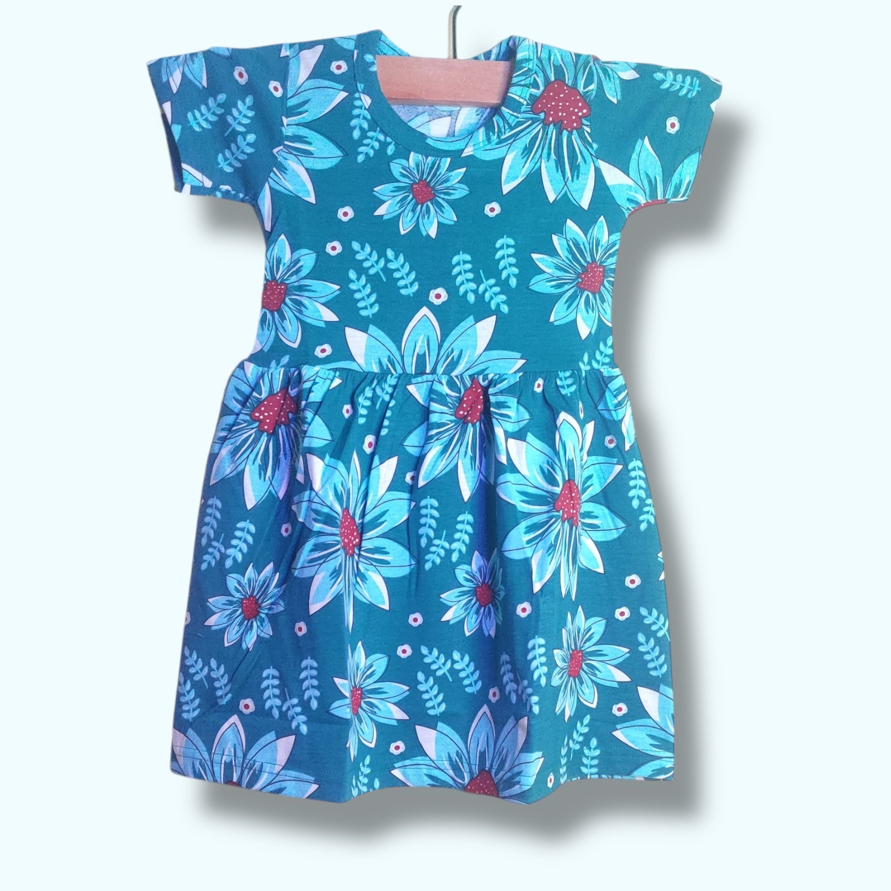 Teal blue baby frock with floral printed design
