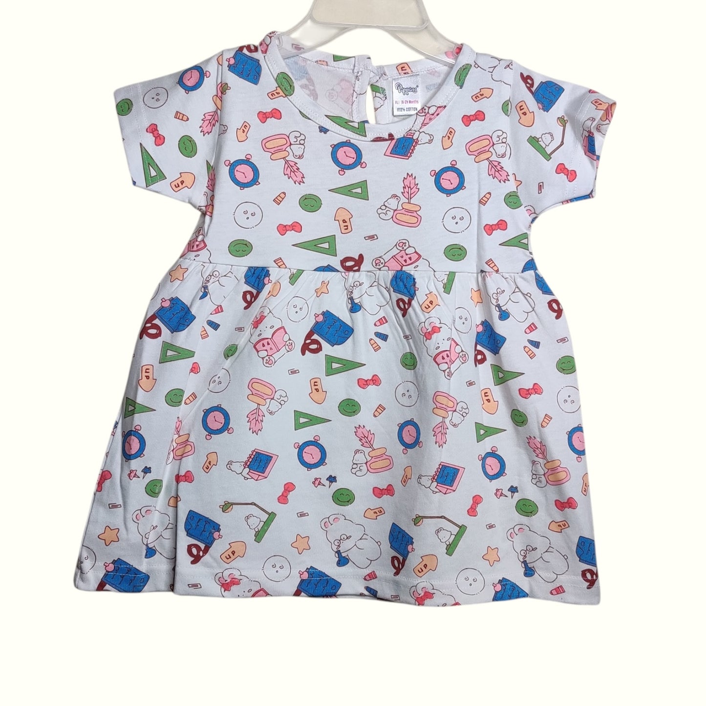 White baby frock with printed multicolor design