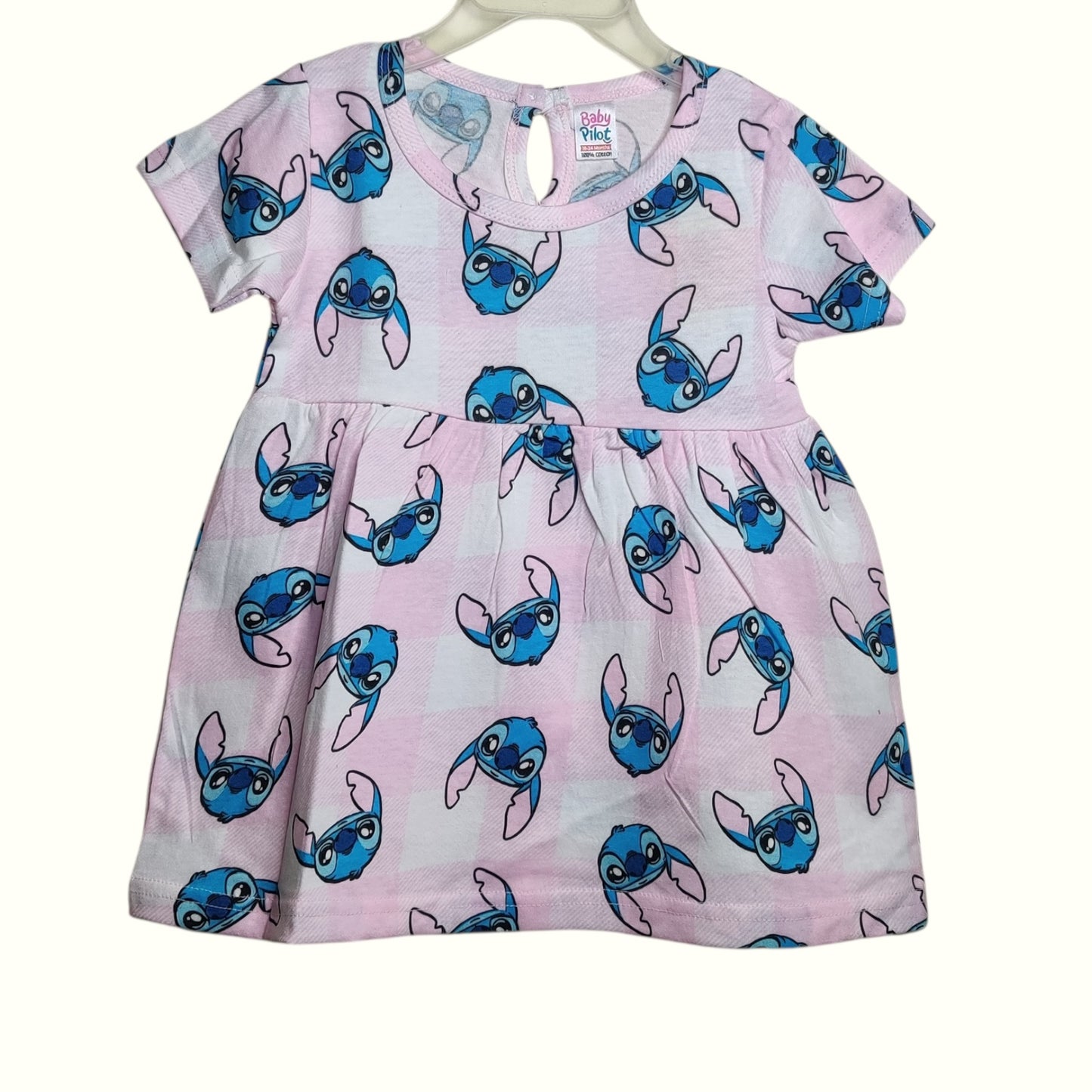 White and pink baby frock with printed cartoon character design