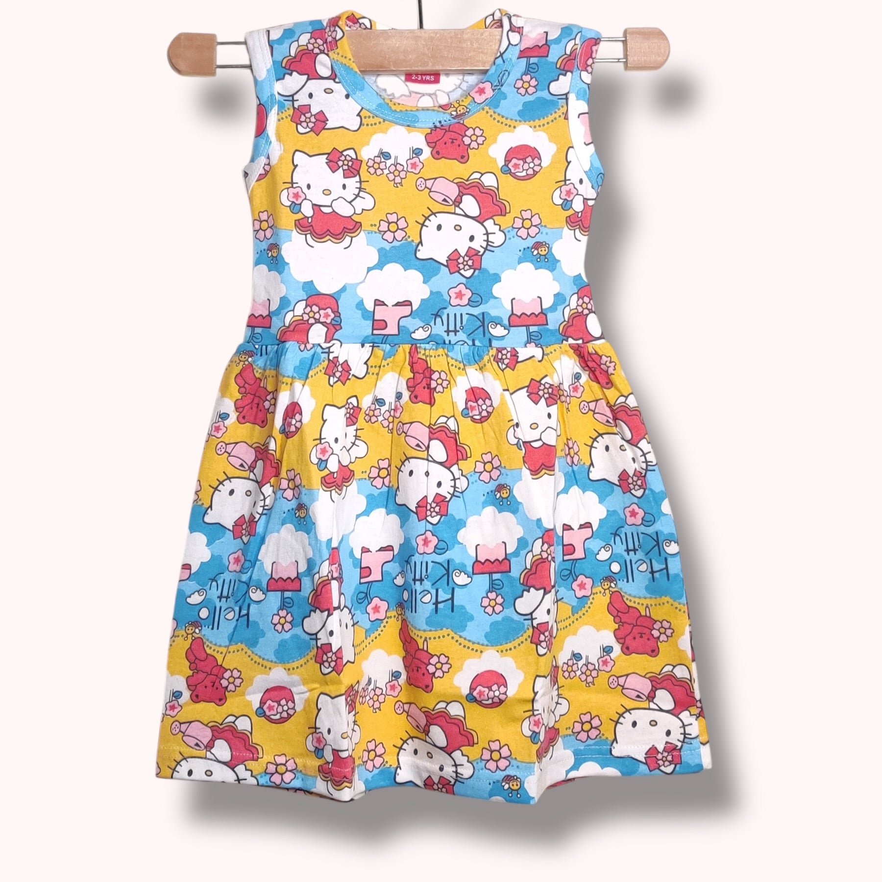 Yellow and sky blue baby frock with cute cartoon character printed design