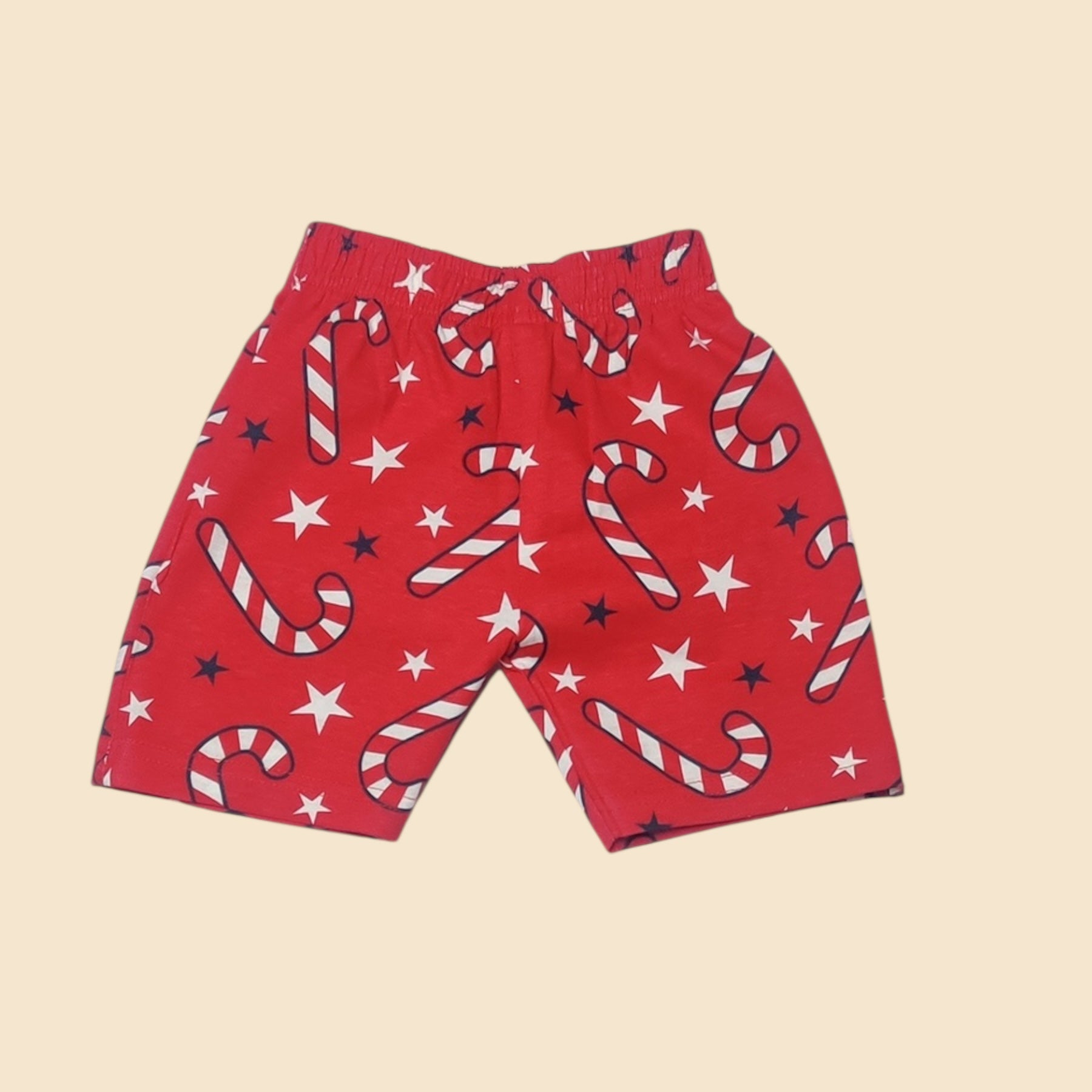 Baby girl red cotton shorts with candy cane and star print