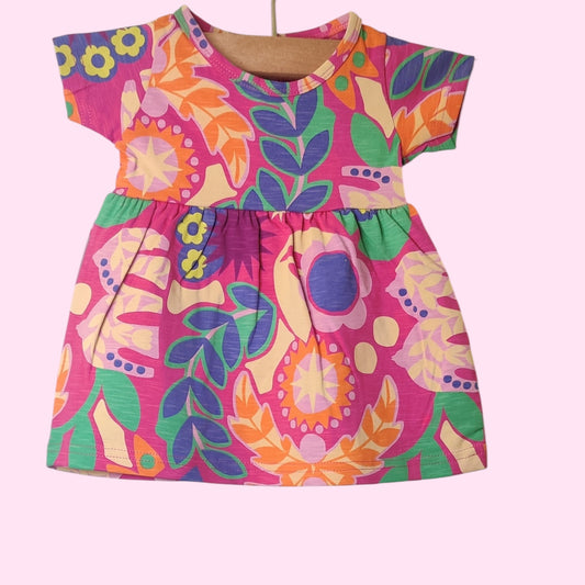 Baby girl frock front – warm pink with floral print