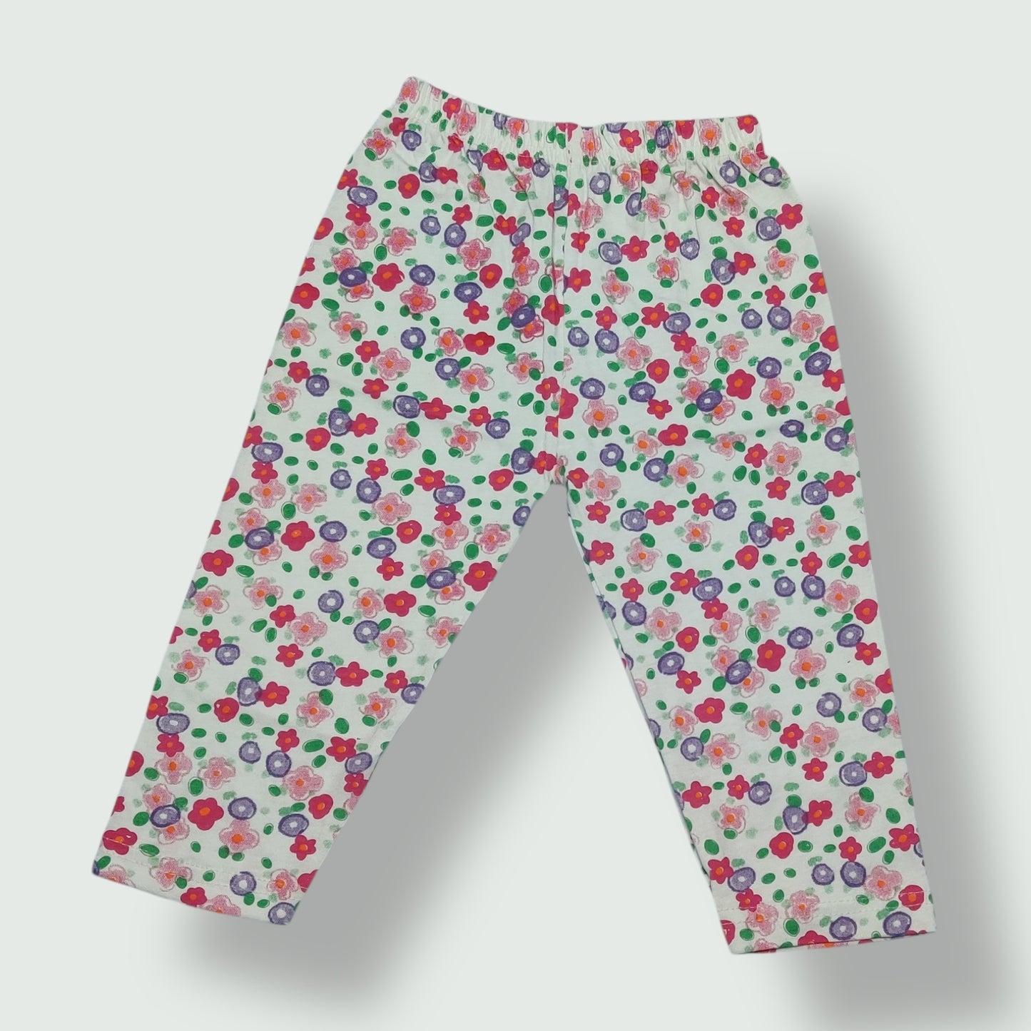 Multicolor cotton baby pant with colourful floral print front view