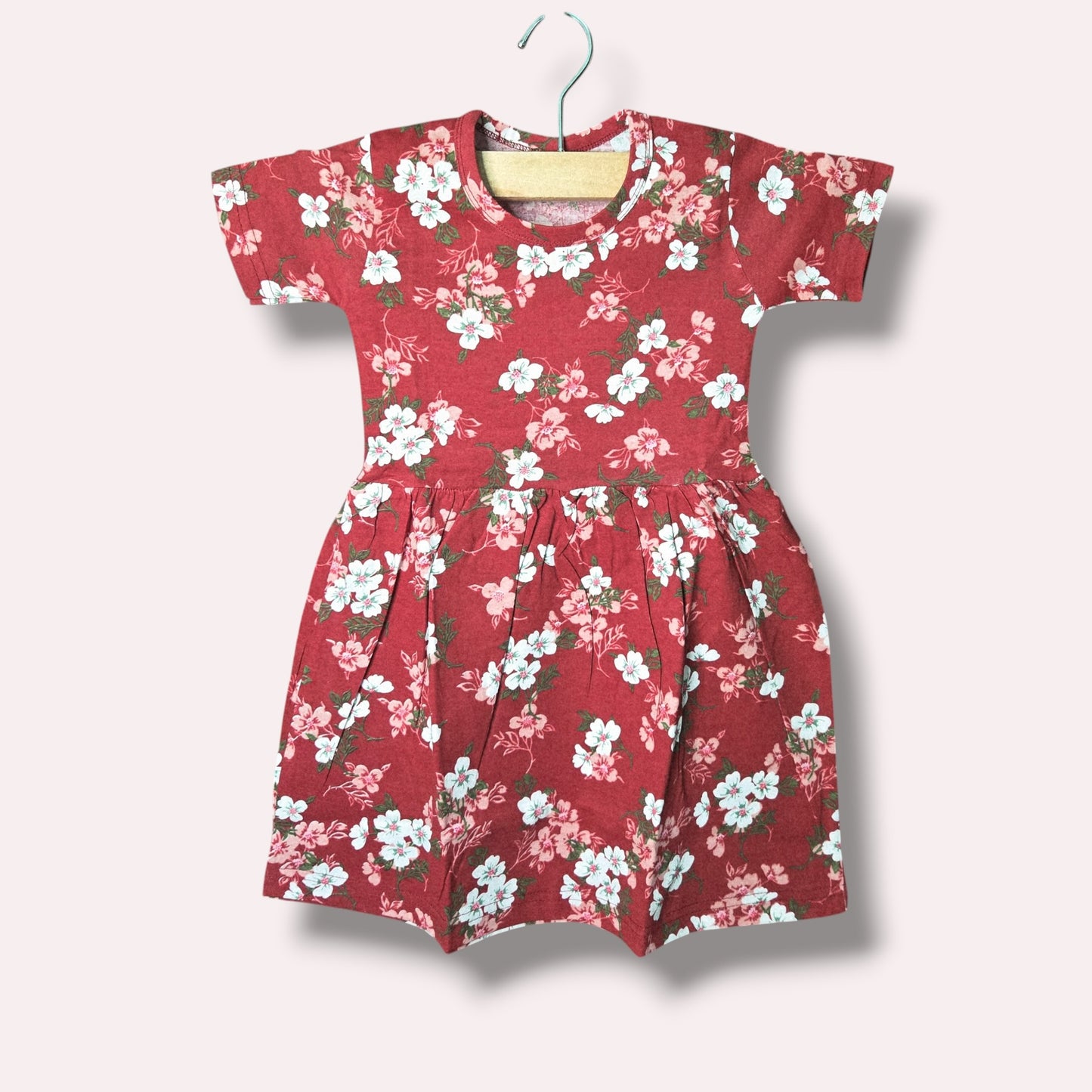 Brick red baby short sleeve frock with white and pink floral printed design