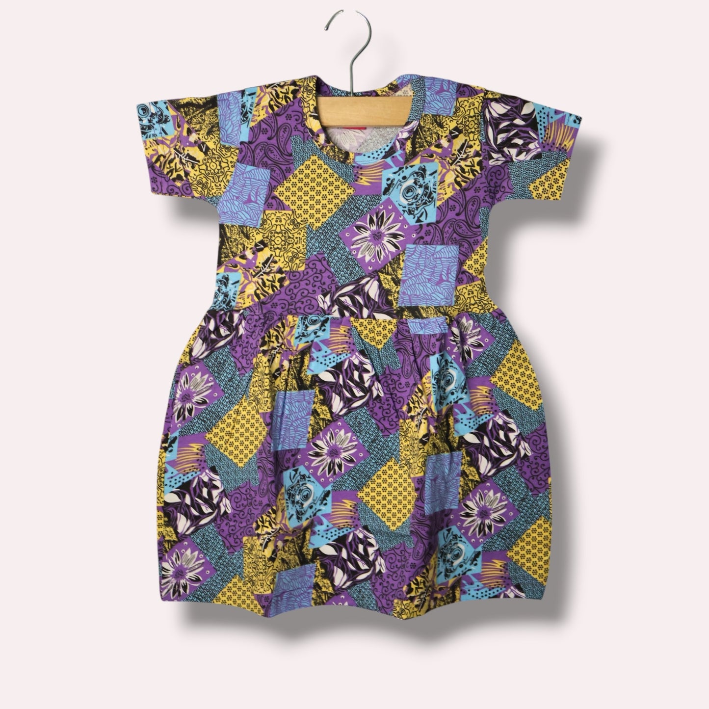 Purple yellow baby short sleeve frock with geometric and floral printed design