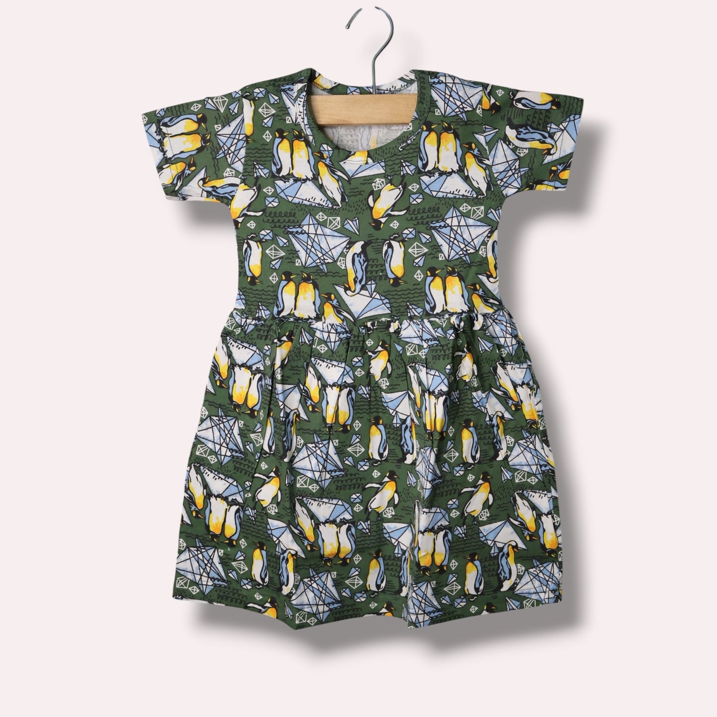 Forest green baby short sleeve frock with penguin and geometric printed design