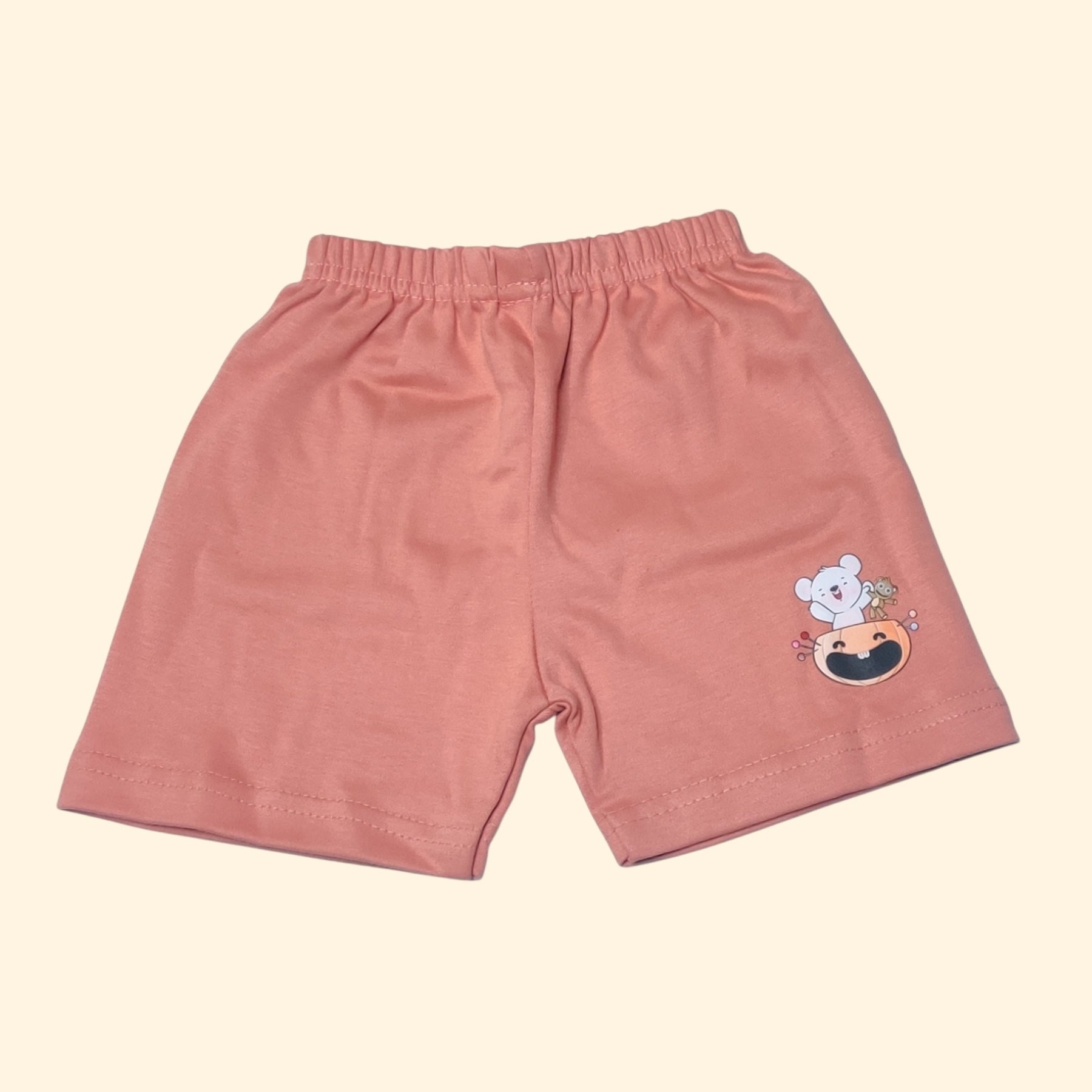 Peach pink baby shorts with printed bear and pumpkin