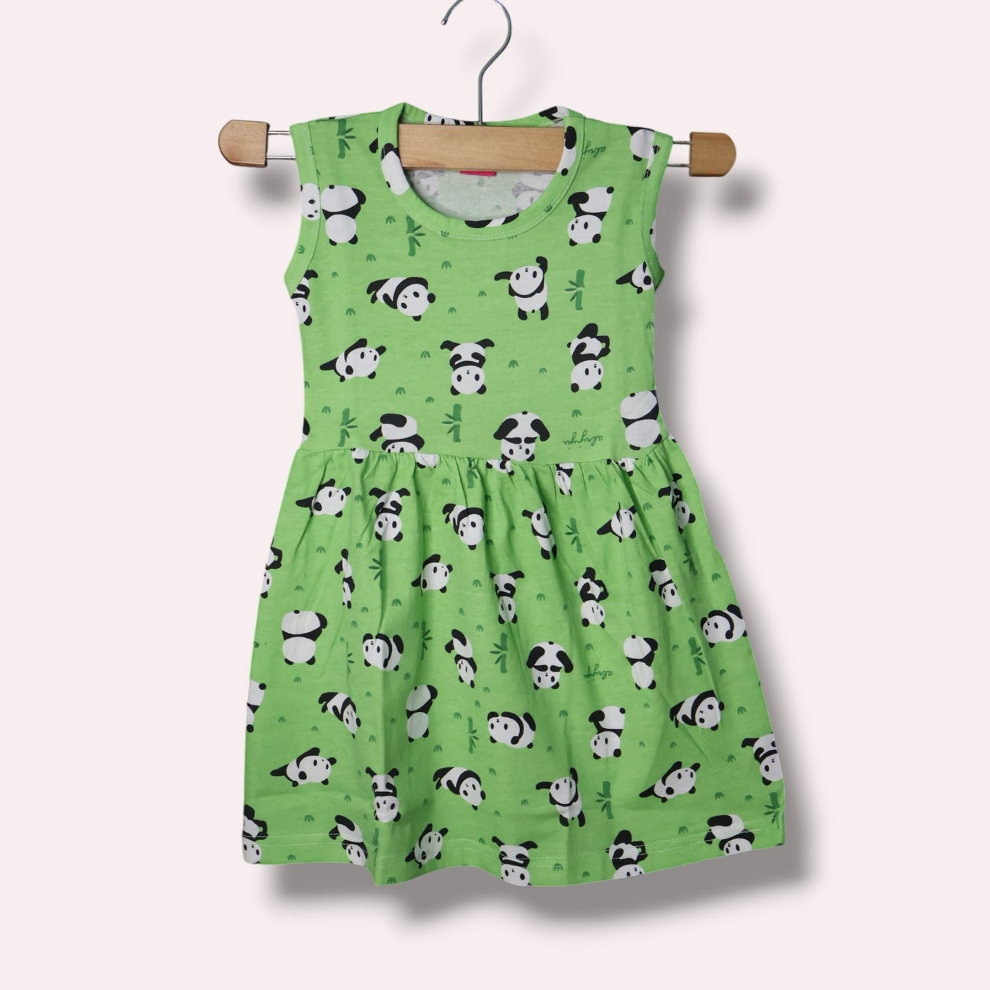 Apple green baby sleeveless frock with panda and bamboo printed design