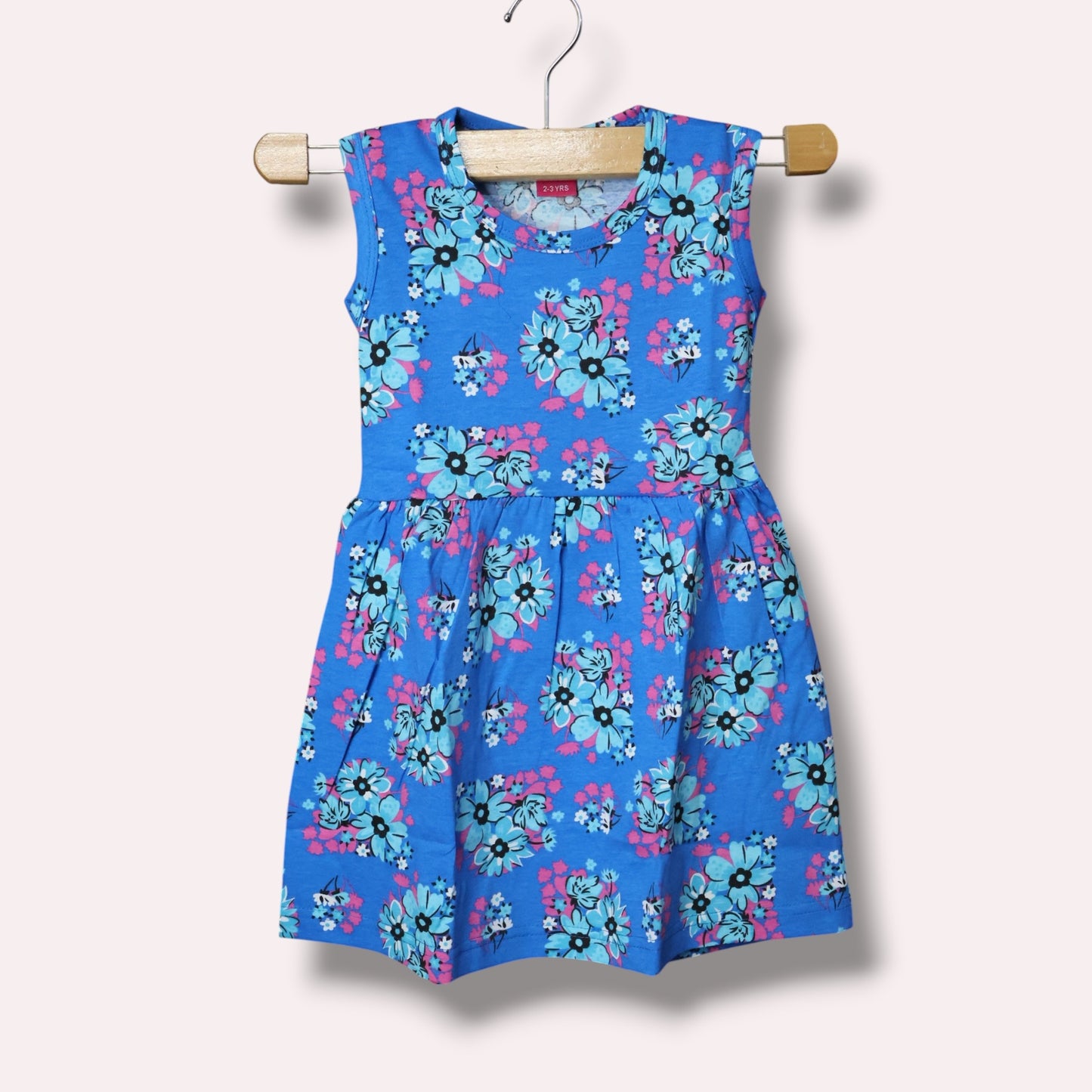 Blue baby sleeveless frock with light blue and pink floral printed design