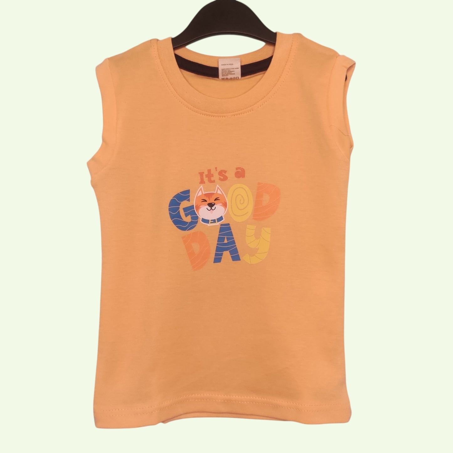 Fluorescent orange sleeveless baby t-shirt with printed text