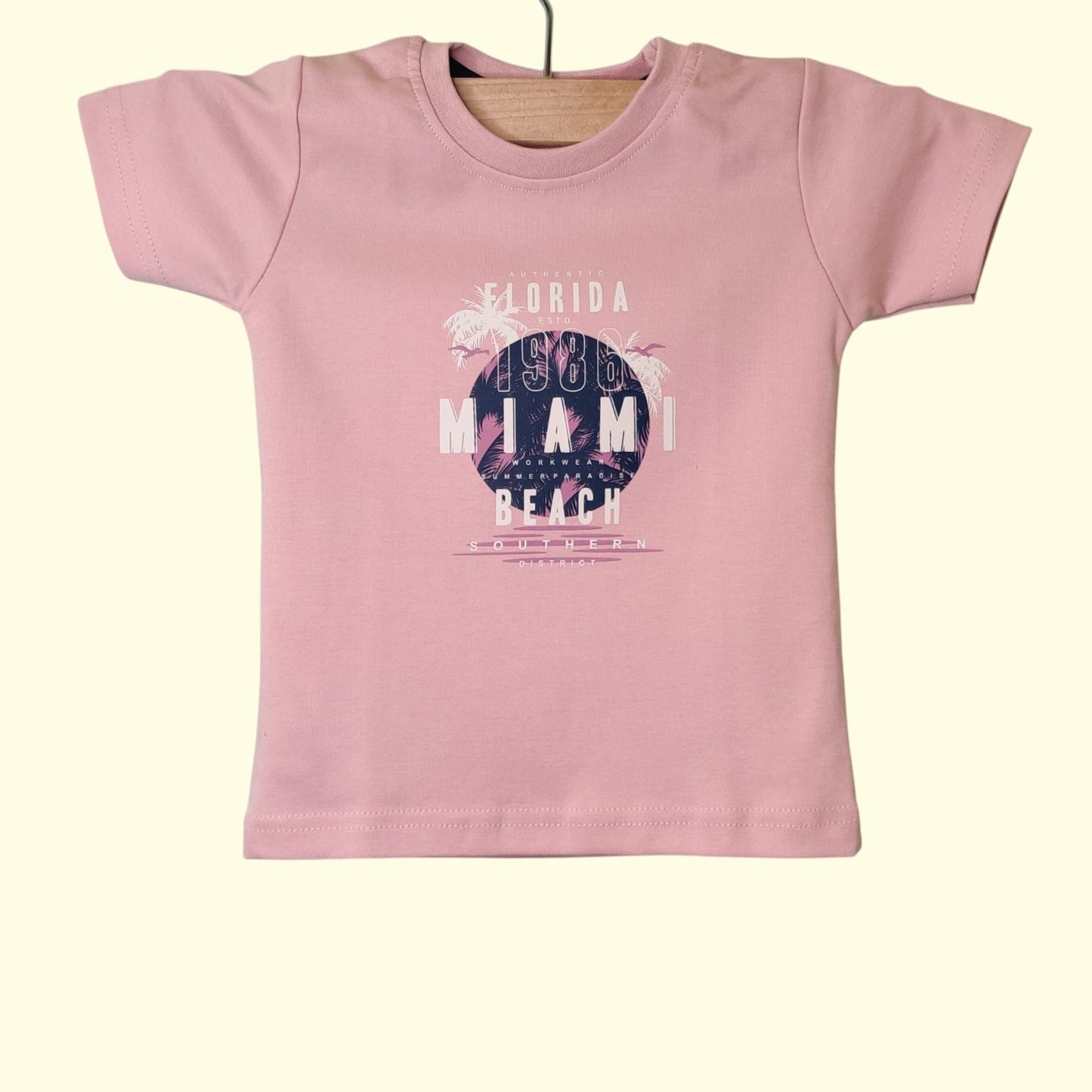Front view of dusty rose soft cotton baby t-shirt with chest print