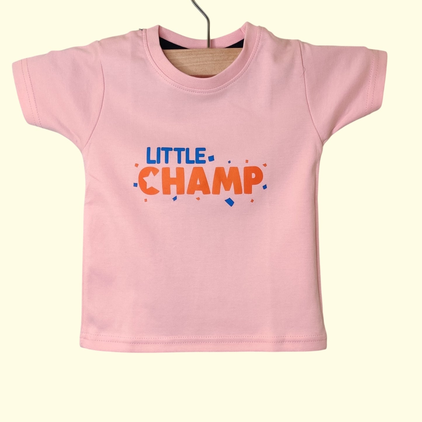 Front view of pastel pink soft cotton baby t-shirt with chest print