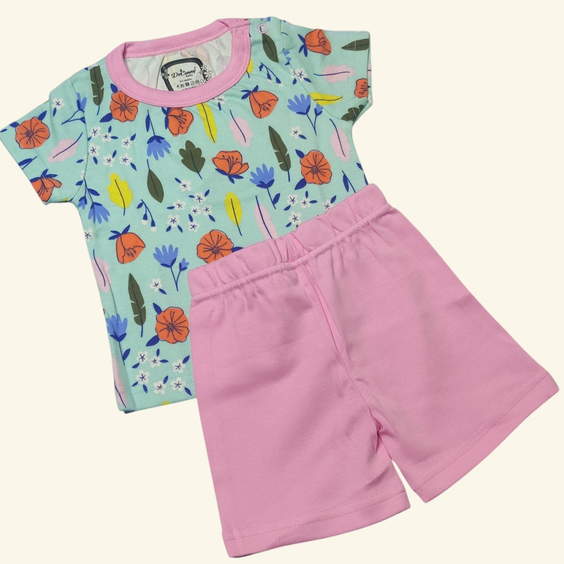Mint green floral printed baby girl t-shirt with petal pink shorts set front view
