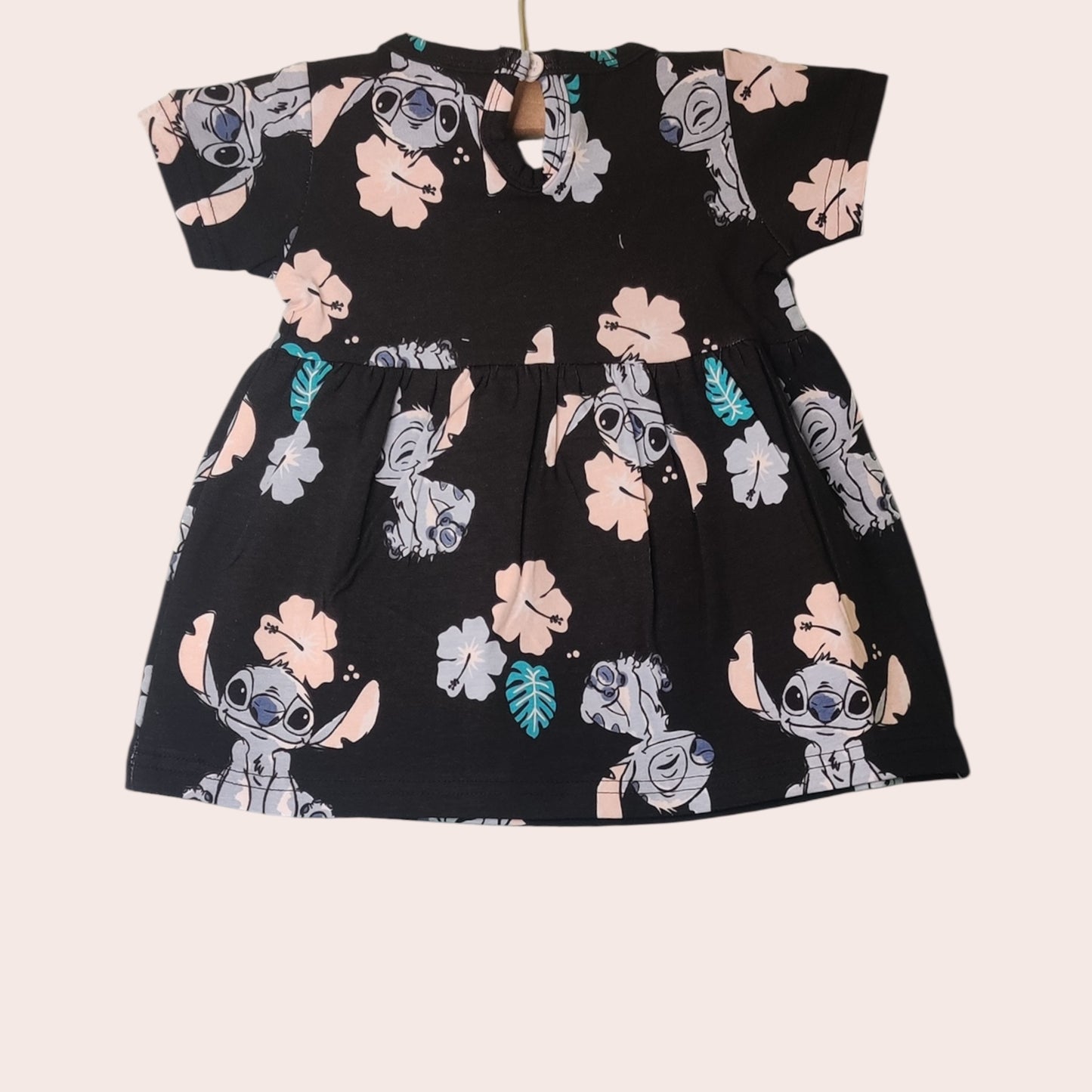 Black cotton baby girl frock with cartoon and snap closure