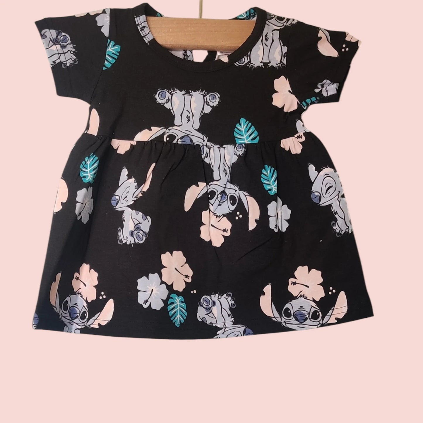Black cotton baby girl frock with cartoon and floral print