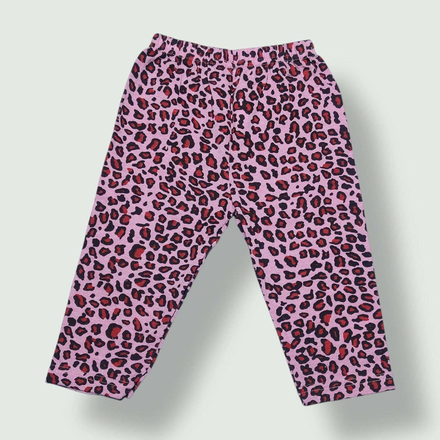 Blush mauve baby pant with leopard print front view