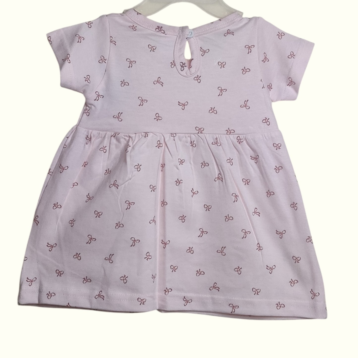 Soft blush beige baby frock back view