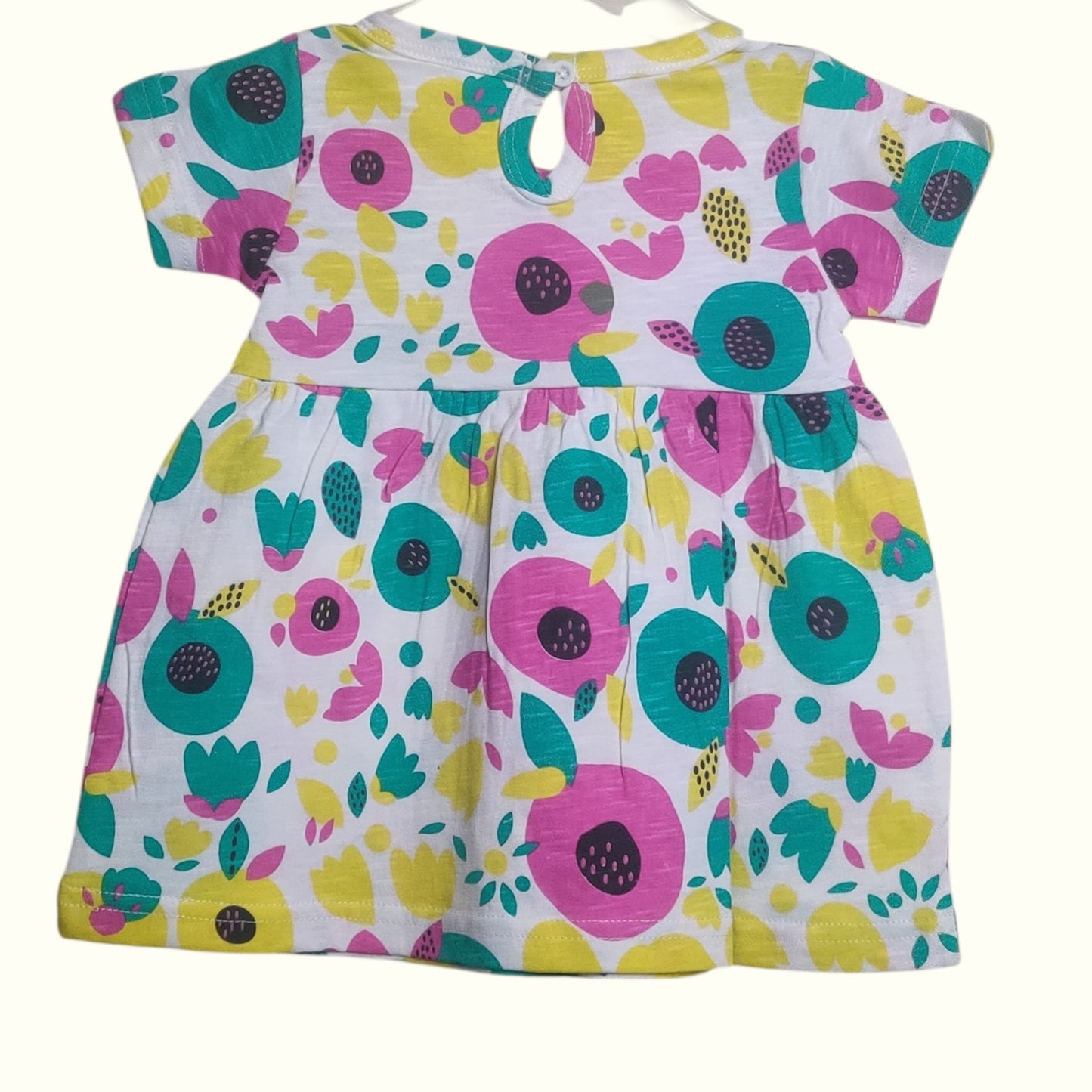 White with multicolor cotton printed baby frock back view