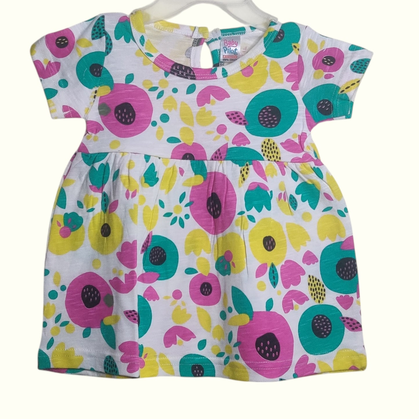 White with multicolor cotton printed baby frock front view
