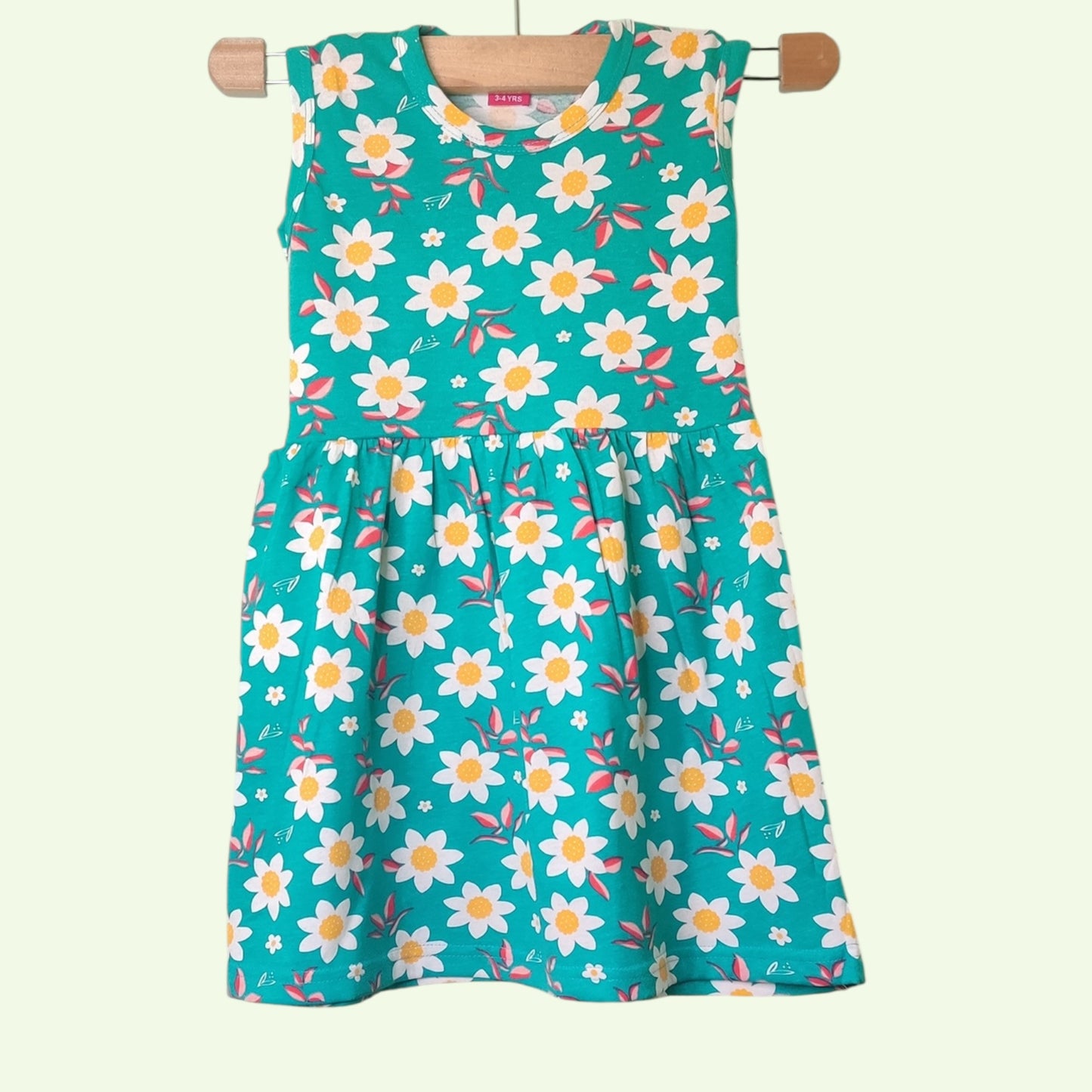 Teal baby frock with printed floral design