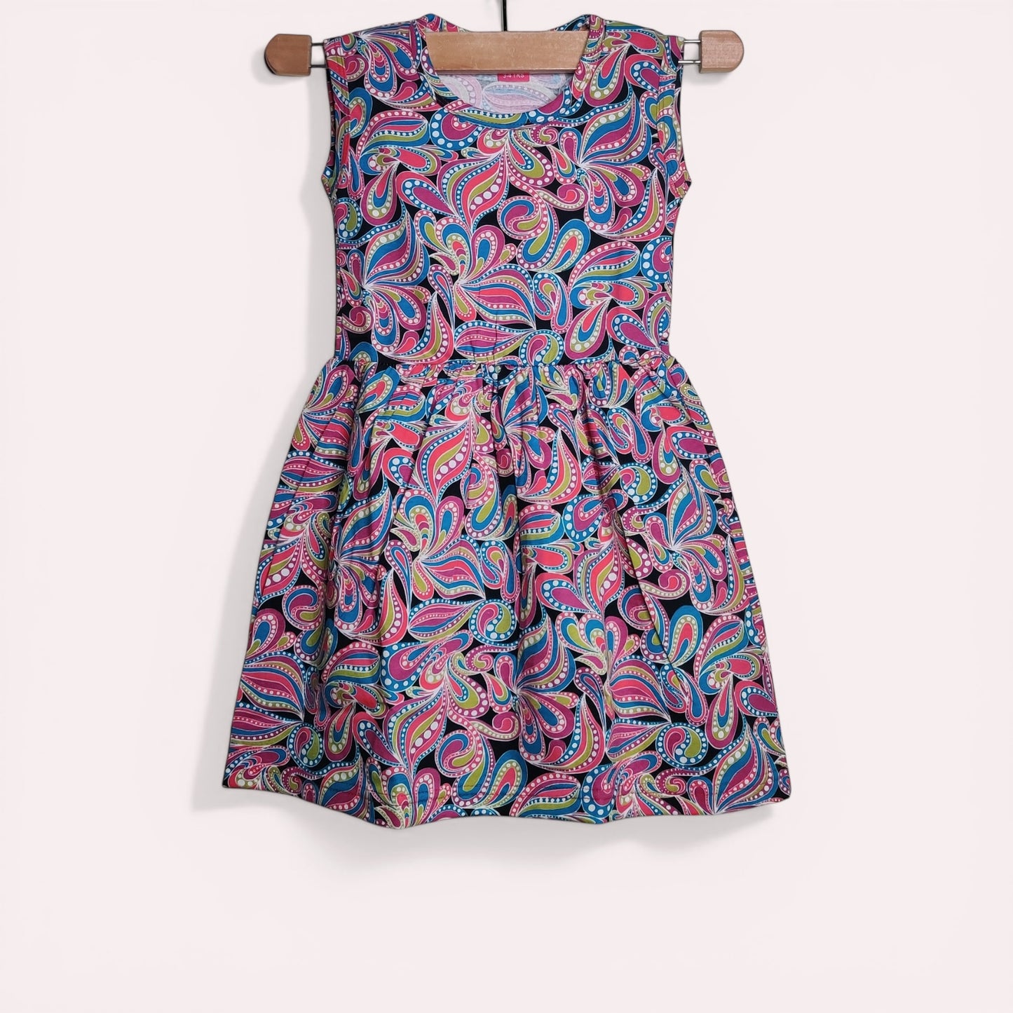 Soft cotton baby frock with printed paisley design