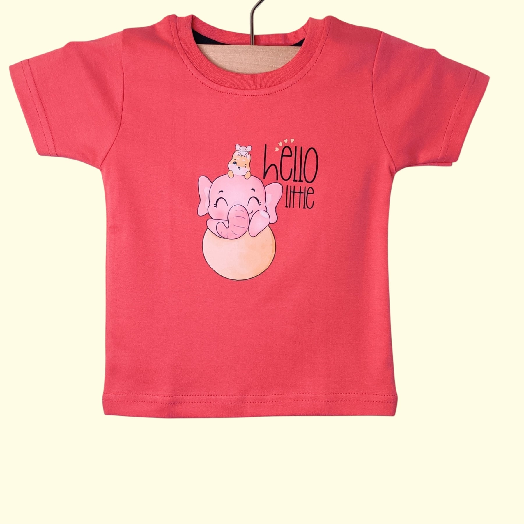 Coral pink baby t-shirt with round neck and short sleeves in soft cotton