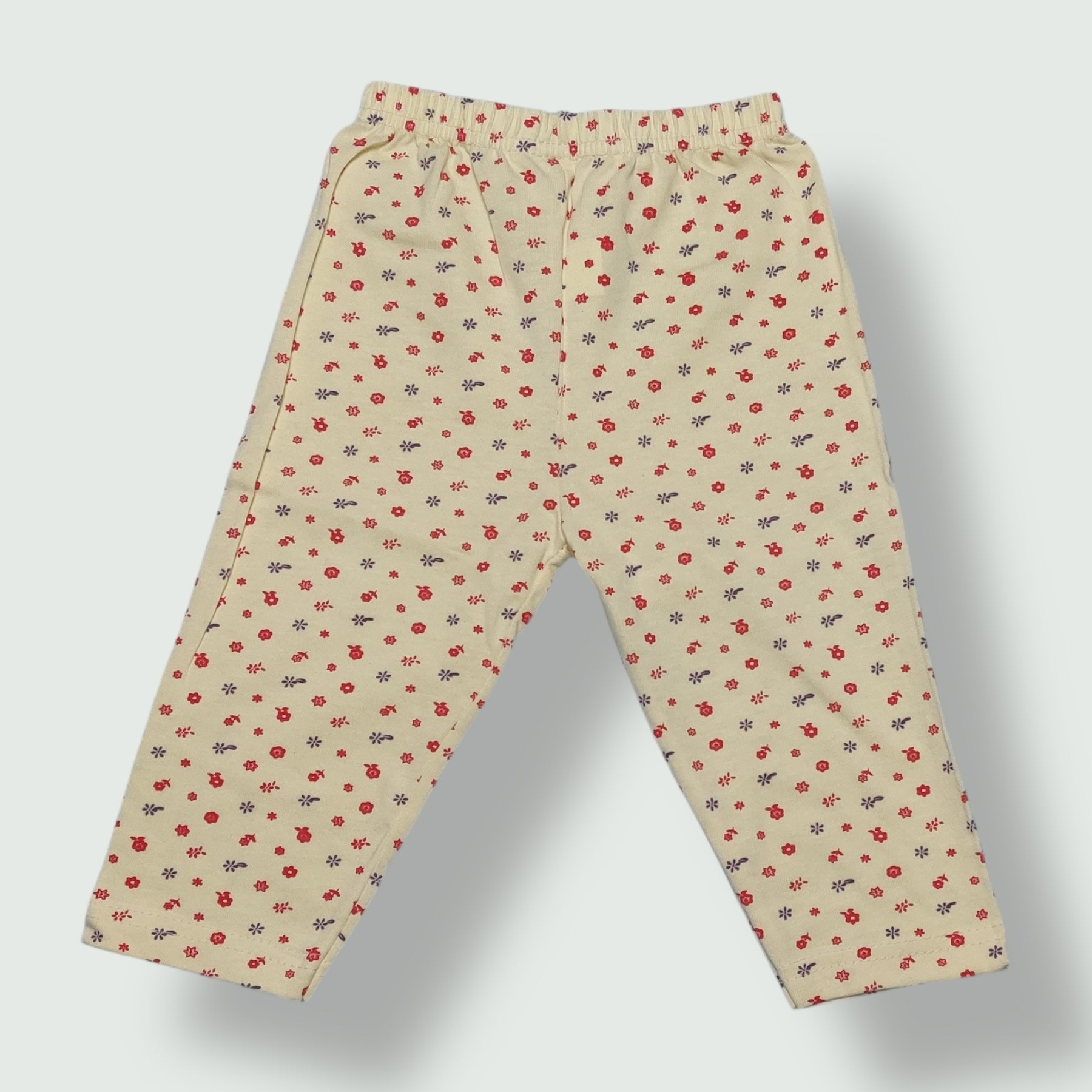 Soft beige baby pant with floral prints
