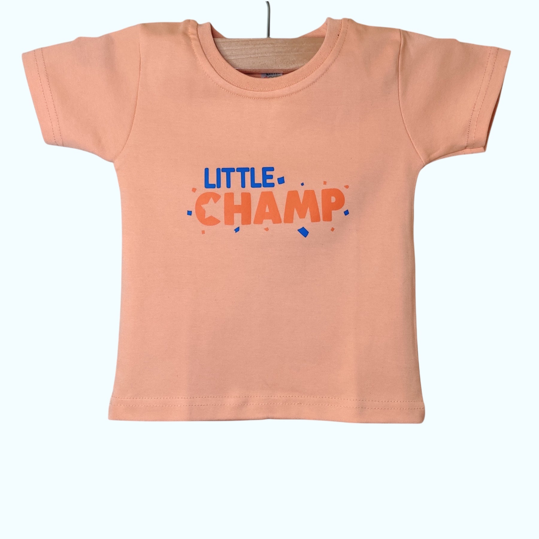 Light orange baby soft cotton t-shirt with "Little Champ" text print