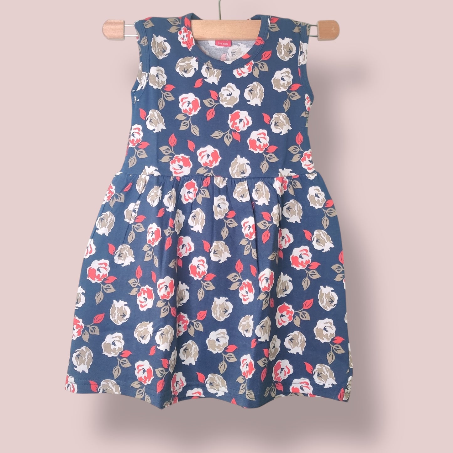 Pebble blue toddler frock with all-over rose floral print