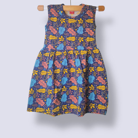 Navy breeze toddler sleeveless frock with all-over colorful leaf print